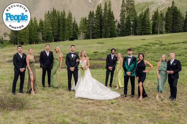 <p>Bryson G Visuals</p> Chase McNary and Ellie White are pictured with their wedding party.