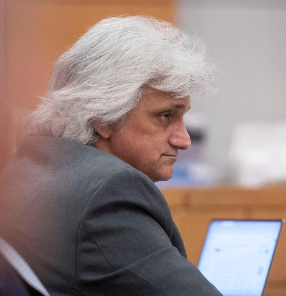 Gregory Malarik listens to opening statements during the court on Tuesday, June 14, 2022,  in the death of his wife, Sherri Malarik.  Malarik's wife was found dead in a Cantonment Winn Dixie parking lot on Sept. 22, 2001.