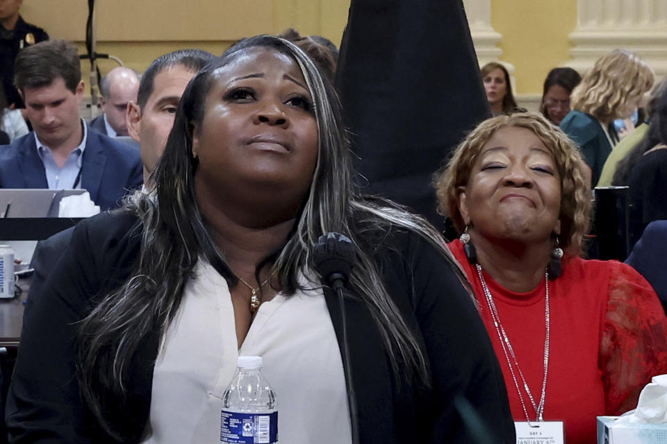 Wandrea "Shaye" Moss, a former Georgia election worker, testifies as he mother, Ruby Freeman listens, as the House select committee investigating the Jan. 6 attack on the U.S. Capitol continues to reveal its findings of a year-long investigation, at the Capitol in Washington, Tuesday, June 21, 2022. (Michael Reynolds/Pool Photo via AP)