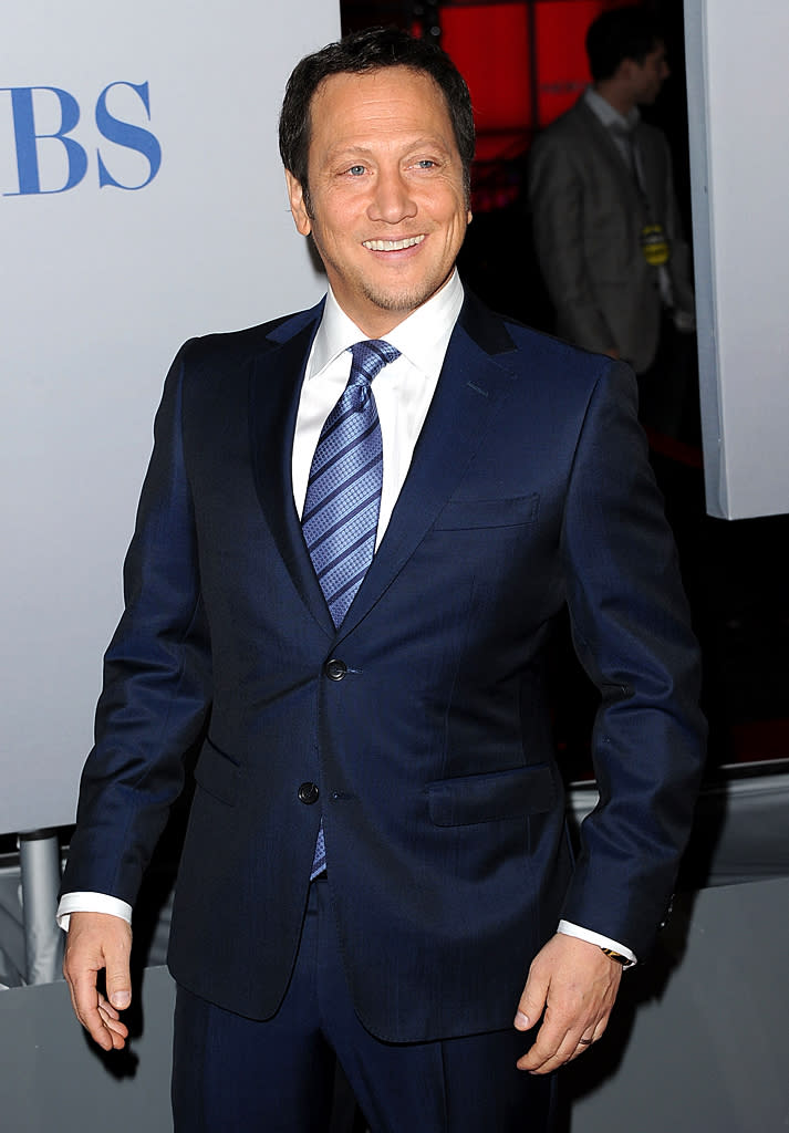 Funny man Rob Schneider looked like an elder statesman in his blue suit and...