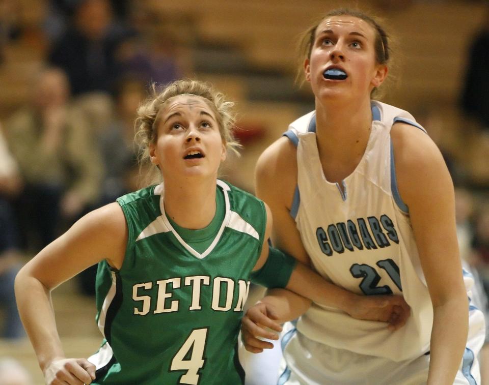 Mt. Notre Dame's Kendall Hackney, right, scored 51 points across her four state finals games, which helped her land Ms. Ohio Basketball after her senior campaign in 2009.