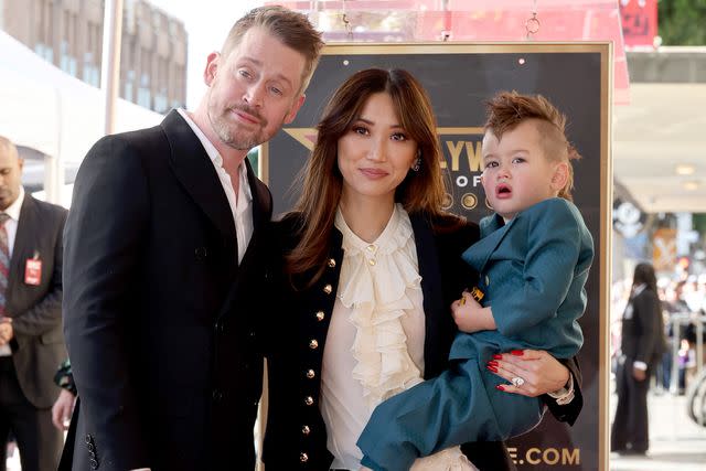 <p>Amy Sussman/Getty</p> Macaulay Culkin, Brenda Song and Dakota Song Culkin at Friday's Hollywood Walk of Fame ceremony