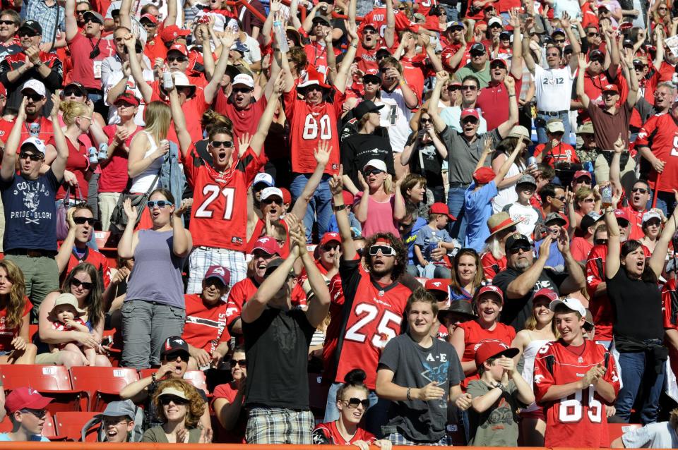 Calgary Stampeders' fans celebrate a touchdown against the Montreal Alouettes during first half CFL acton in Calgary on Friday July 1st, 2011. CFL PHOTO-Larry MacDougal