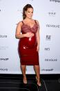 <p>The Daily Front Row's 7th annual Fashion Media Awards: Ashley Graham attends the awards show in a fitted red latex dress, embracing her new baby bump.</p>