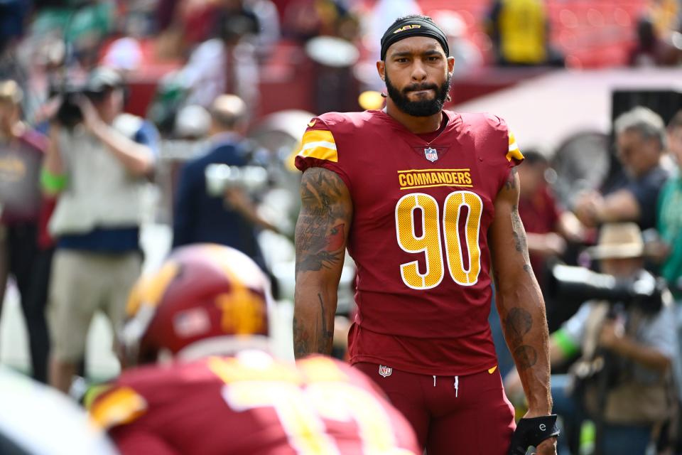 Washington Commanders defensive end Montez Sweat (90) on the field before the game against the Philadelphia Eagles at FedExField.