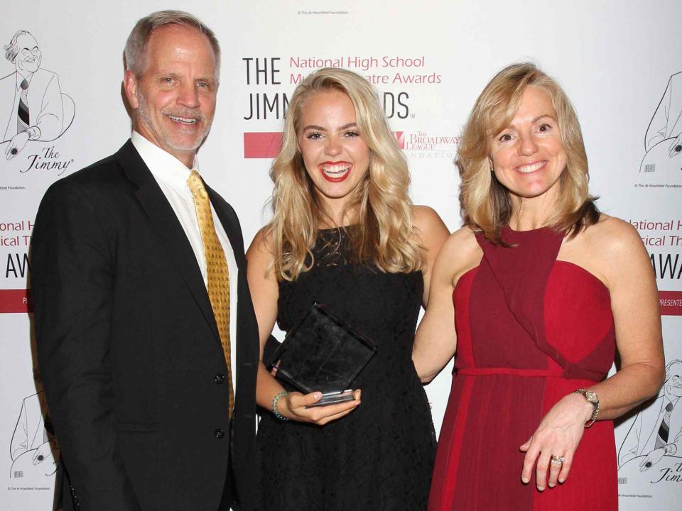<p>Henry McGee/MediaPunch/Alamy</p> Renee Rapp with her parents Charlie Rapp and Denise Rapp at the 2018 National High School Musical Theatre Awards After-Party in New York City on June 25, 2018.