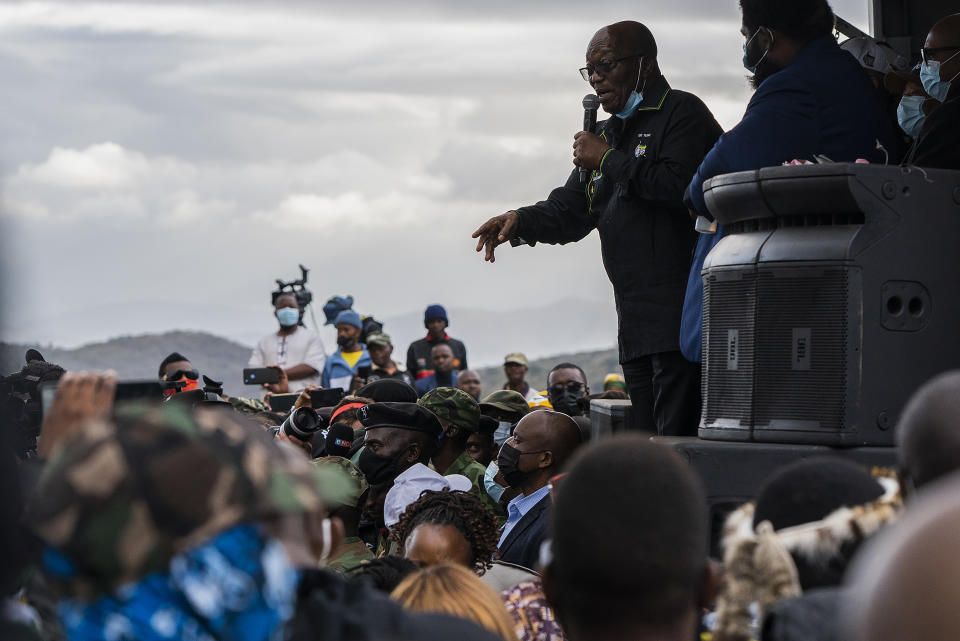 Former president Jacob Zuma addresses his supporters at his home in Nkandla, KwaZulu-Natal Natal Province, Sunday, July 4, 2021. The Constitutional Court will hear Zuma's urgent application on July 12 to rescind its order sentencing him to jail for 15 months for contempt of court. Zuma was initially supposed to hand himself over to authorities for his incarceration by Sunday. (AP Photo/Shiraaz Mohamed)