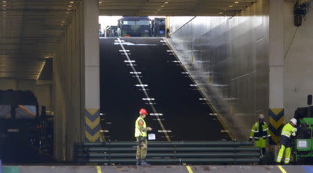 A Norwegian soldier is seen on board a cargo ship as German military equipment is unloaded at Fredrikstad, Norway, September 7, 2018. REUTERS/Gwladys Fouche