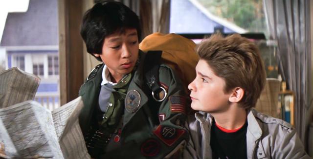 USA. Corey Feldman  and Ke Huy Quan in a scene from &#xa9;Warner Bros. film: The Goonies (1985). Plot: A group of young misfits called The Goonies discover an ancient map and set out on an adventure to find a legendary pirate&#39;s long-lost treasure.  Ref:  LMK110-J6911-271020 Supplied by LMKMEDIA. Editorial Only. Landmark Media is not the copyright owner of these Film or TV stills but provides a service only for recognised Media outlets. pictures@lmkmedia.com
