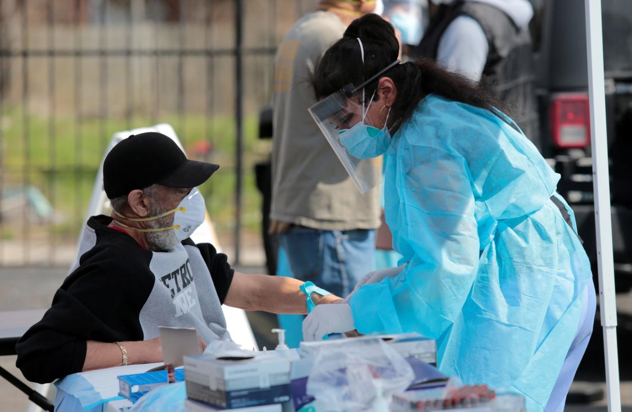 FILE PHOTO: A Detroit resident is tested for free for the coronavirus disease (COVID-19) and antibodies at the Sheffield Center in Detroit, Michigan, U.S., April 28, 2020. REUTERS/Rebecca Cook