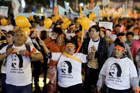 Supporters of Keiko Fujimori, daughter of former president Alberto Fujimori and leader of the opposition in Peru, protest against her detention in Lima, Peru October 15, 2018. REUTERS/Guadalupe Pardo