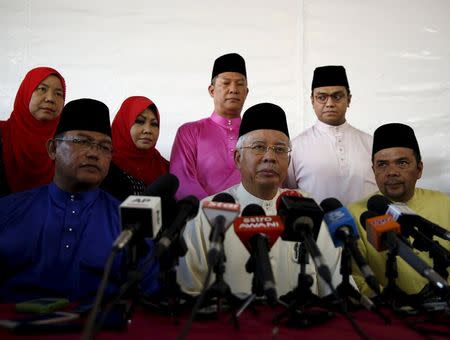 Malaysia's Prime Minister Najib Razak speaks to the media at a mosque outside Kuala Lumpur, Malaysia, July 5, 2015. REUTERS/Olivia Harris