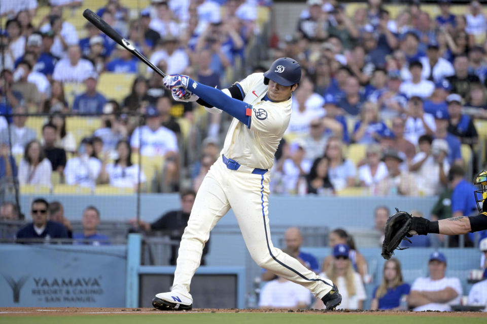 Los Angeles Dodgers' Shohei Ohtani grounds out in the first inning against the Pittsburgh Pirates during a baseball game Saturday, Aug. 10, 2024, in Los Angeles. (AP Photo/Jayne-Kamin-Oncea)