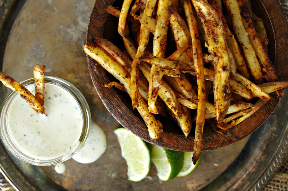 <p>Shea Goldstein</p><p>Seasoned hand-cut fries dipped in cilantro lime salsa verde ranch is a winning side. Get the recipe <a href="https://parade.com/842424/sheagoldstein/mexican-street-fries-with-cilantro-lime-salsa-verde-ranch/" rel="nofollow noopener" target="_blank" data-ylk="slk:HERE;elm:context_link;itc:0;sec:content-canvas" class="link ">HERE</a>.</p>