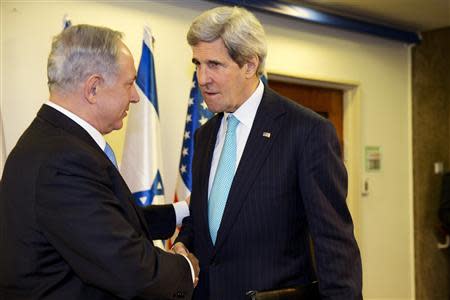 Israeli Prime Minister Benjamin Netanyahu (L) meets with U.S. Secretary of State John Kerry as they meet in Jerusalem March 31, 2014. REUTERS/Jacquelyn Martin