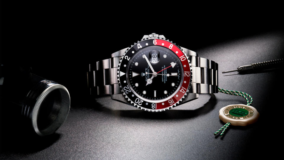 A Rolex certified pre-owned GMT Master II with a new wax tag.