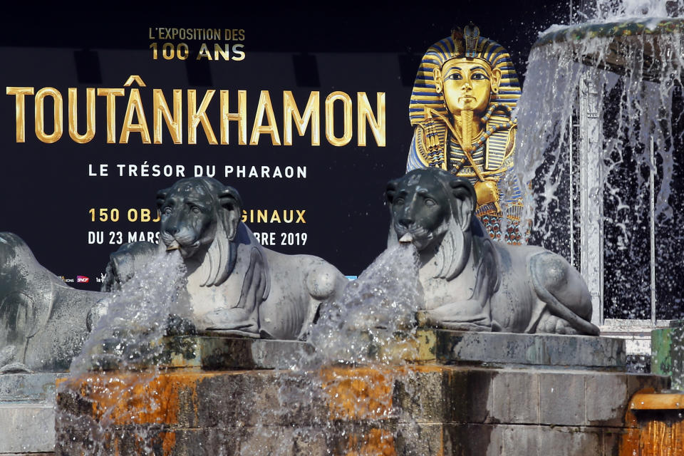 The entrance placard of 'Tutankhamun, the treasure of the Pharaoh', an exhibition in partnership with the Grand Egyptian Museum at the Grande Halle of La Villette in Paris, France, Thursday, March 21, 2019. This exhibition, which runs from 23 March to 15 September 2019. will reveal 150 fascinating original objects found in 1922 in the tomb of the most famous Pharaoh. (AP Photo/Francois Mori)