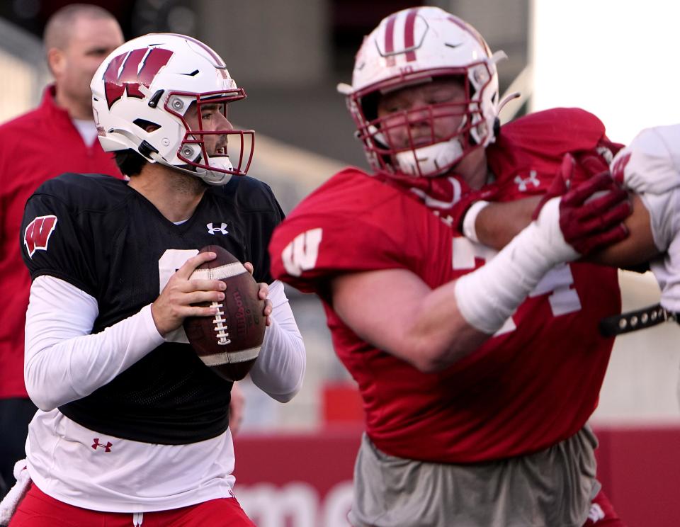 Wisconsin quarterback Tanner Mordecai (8) is shown during practice Tuesday, April 11, 2023 at Camp Randall Stadium in Madison, Wis.