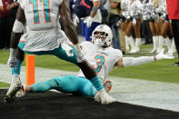 Miami Dolphins wide receiver Will Fuller (3) reacts after making a catch for a two-point conversion against the Las Vegas Raiders during the second half of an NFL football game, Sunday, Sept. 26, 2021, in Las Vegas. (AP Photo/Rick Scuteri)