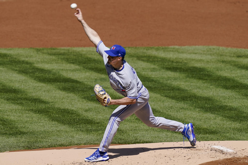 Toronto Blue Jays starting pitcher Ross Stripling throws during the first inning of a baseball game against the New York Yankees, Saturday, April 3, 2021, in New York. (AP Photo/John Minchillo)