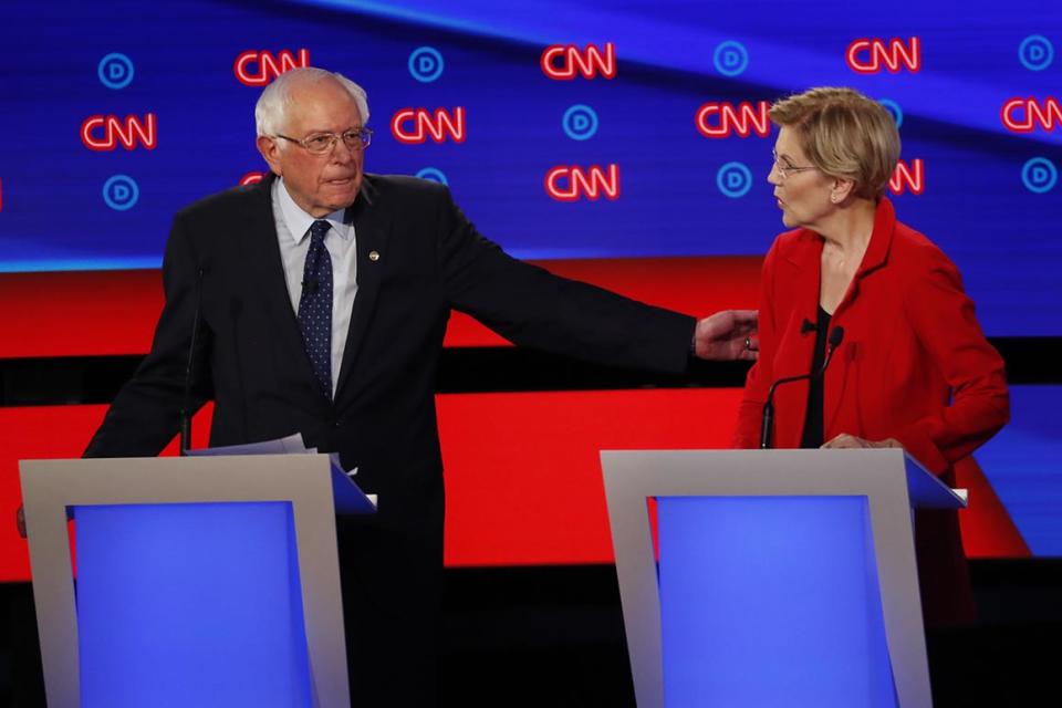 Sen. Bernie Sanders, I-Vt., gestures toward Sen. Elizabeth Warren, D-Mass., during the first of two Democratic presidential primary debates hosted by CNN Tuesday, July 30, 2019, in the Fox Theatre in Detroit. (AP Photo/Paul Sancya)