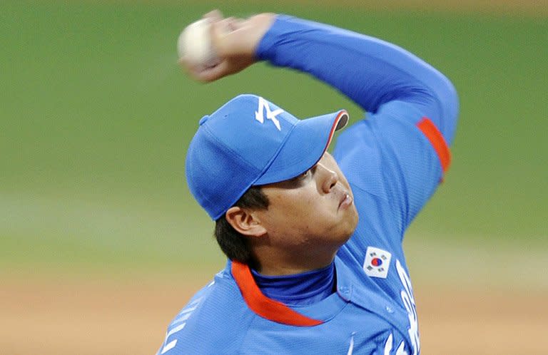 Ryu Hyun-jin throws for South Korea against Cuba at the 2008 Beijing Olympic Games. The Los Angeles Dodgers say they're looking forward to watching Ryu Hyun-jin pitch for them after signing the top South Korean left-hander to a six-year deal worth a reported $36 mn