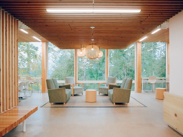 Inside, floor-to-ceiling windows in the reception area bring in southern light.