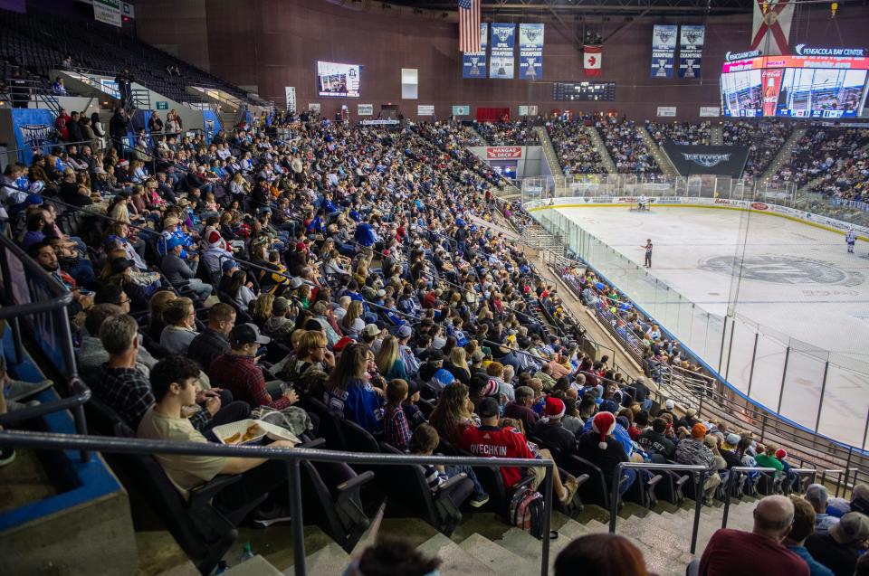 Hockey fans take in a Pensacola Ice Flyers game at the Pensacola Bay Center Saturday, December 23, 2023.