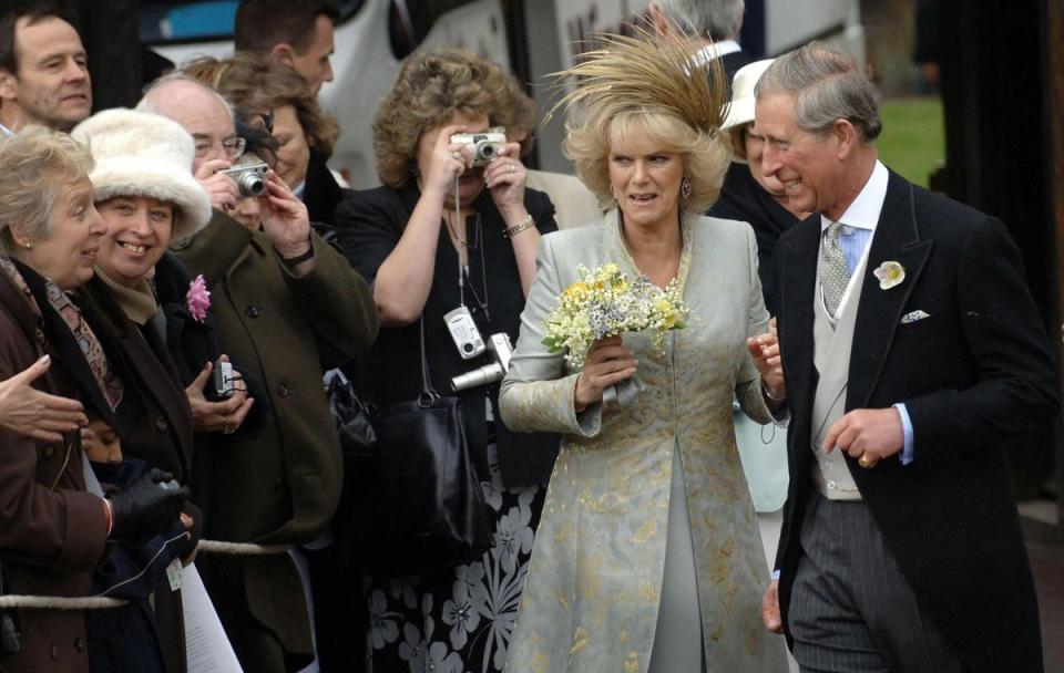 Charles and Camilla meet members of the public outside St George's Chapel in Windsor after the blessing of their civil marriage, in April 2005 (AFP/Getty Images)