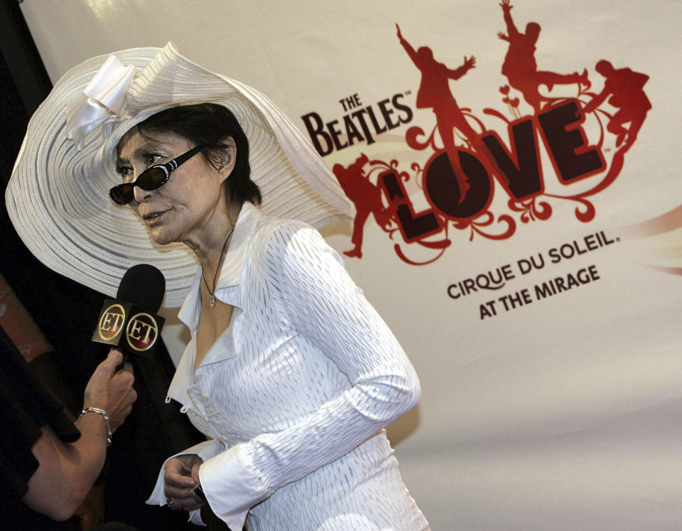 FILE - Yoko Ono arrives at the premier of The Beatles "LOVE" by Cirque du Soleil at The Mirage hotel and Casino in Las Vegas, June 30, 2006. On Tuesday, April 9, 2024, it was announced that the final curtain will come down July 7 on Cirque du Soleil's long-running show “The Beatles Love," a cultural icon on the Las Vegas Strip that brought band members Paul McCartney and Ringo Starr back together for public appearances throughout its 18-year run. (AP Photo/Laura Rauch, File)