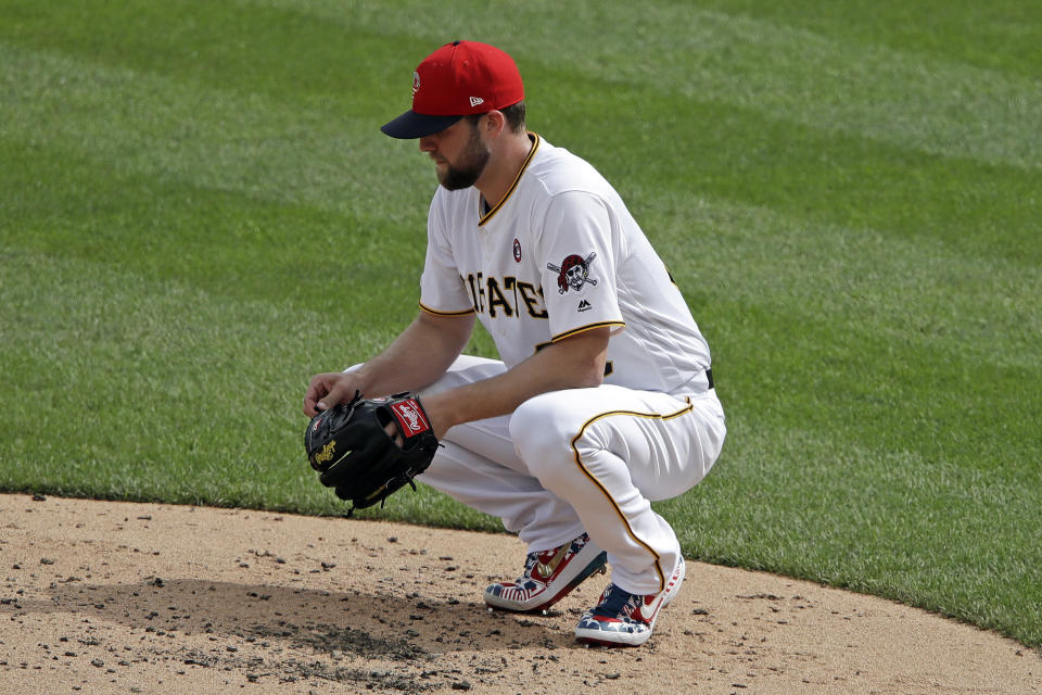 Pittsburgh Pirates starting pitcher Jordan Lyles collects himself on the mound as Chicago Cubs' Willson Contreras rounds the bases after hitting a two-run home run during the third inning of a baseball game in Pittsburgh, Thursday, July 4, 2019. (AP Photo/Gene J. Puskar)