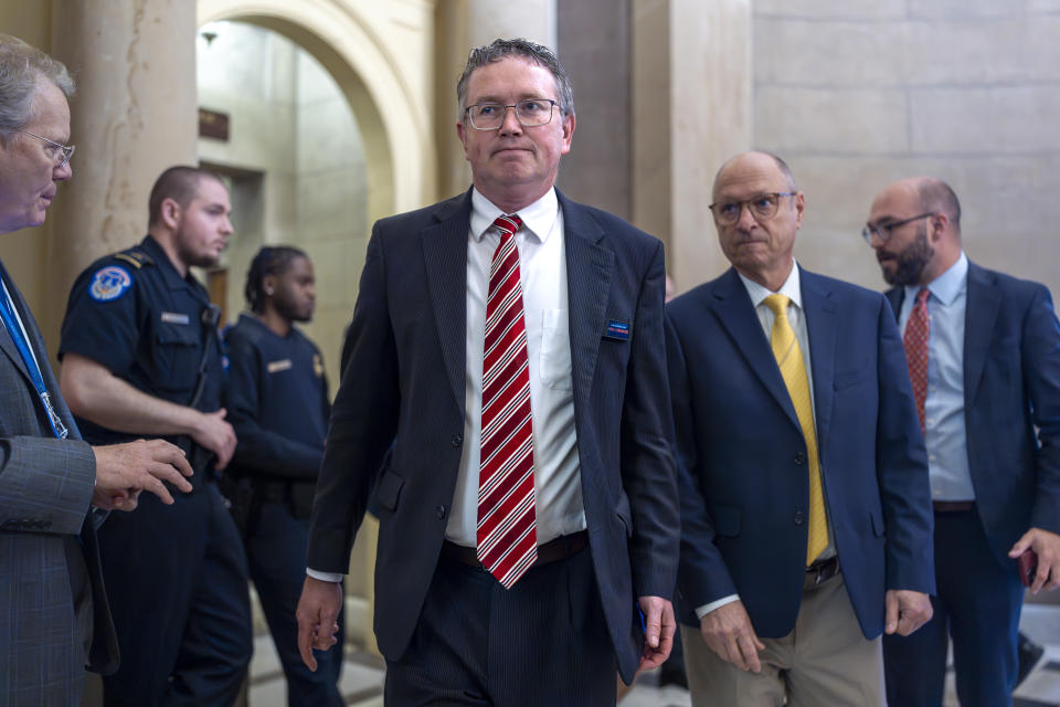 Rep. Thomas Massie, R-Ky., leaves a meeting with House Speaker Mike Johnson, R-La., and Rep. Marjorie Taylor Greene, R-Ga., at the Capitol in Washington, Tuesday, May 7, 2024. (AP Photo/J. Scott Applewhite)