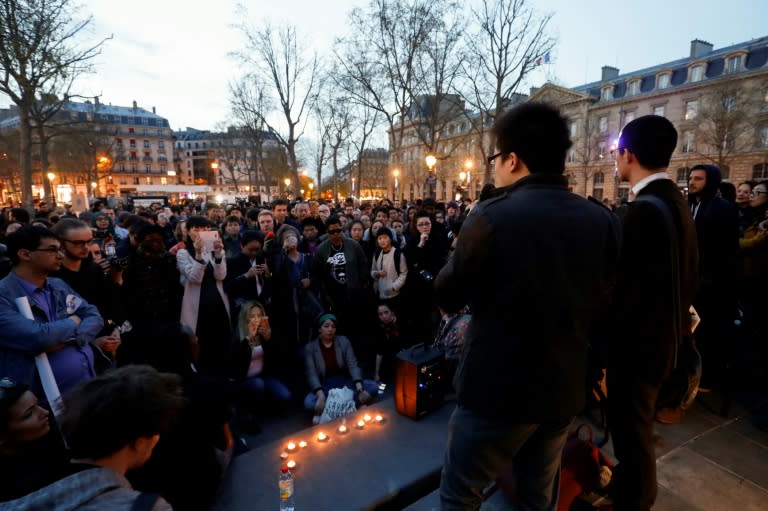 A man speaks during a demonstration for justice on the Place de la Republique on March 30, 2017 following the death of Chinese Liu Shaoyo during a police intervention