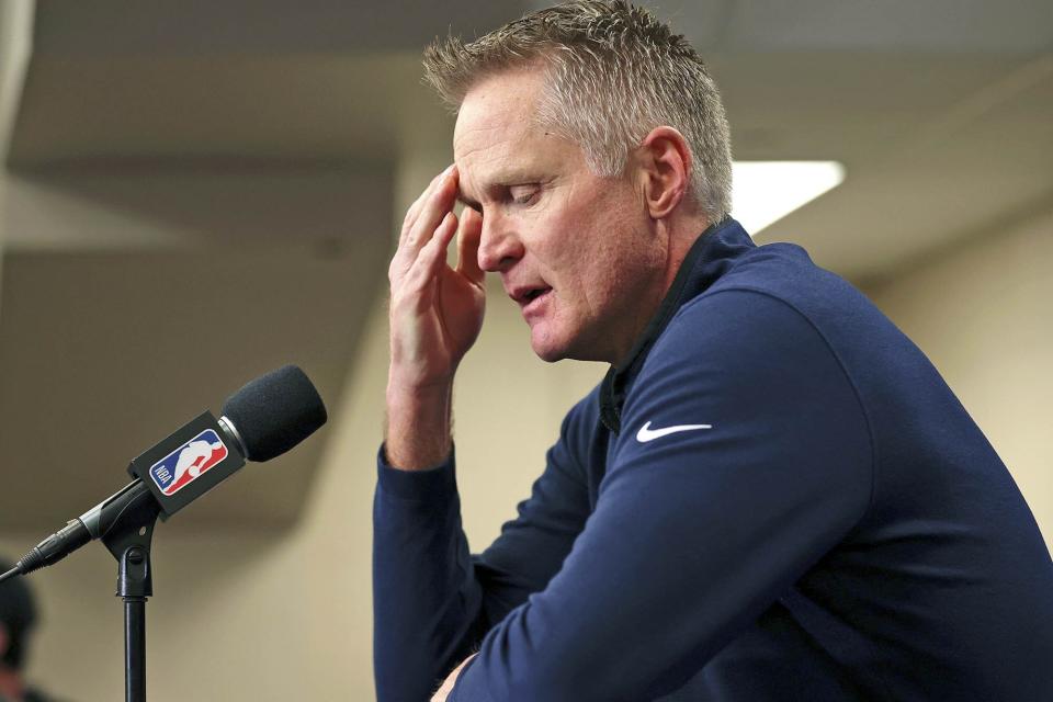 Reacting to the Uvalde, Texas, school shooting earlier in the day, Golden State Warriors coach Steve Kerr makes a statement before Warriors played the Dallas Mavericks in Game 4 of the NBA basketball playoffs Western Conference finals Tuesday, May 24, 2022, in Dallas. (Scott Strazzante/San Francisco Chronicle via AP)