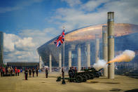 <p>The Union flag flutters during the Royal Gun Salute in Cardiff's Roald Dahl Plass to mark the start of the Platinum Jubilee celebratory weekend.</p> 