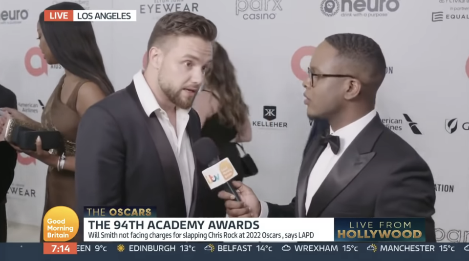 Liam being interviewed at the Oscars