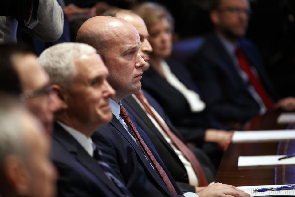 Acting Attorney General Matt Whitaker listens to President Donald Trump speak during a cabinet meeting at the White House, Wednesday, Jan. 2, 2019, in Washington. (AP Photo/Evan Vucci)