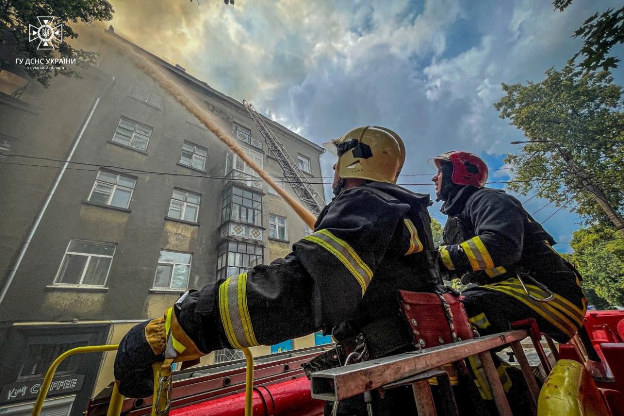 Firefighters work at a site of a residential building hit by a suicide drone, which local authorities consider to be Iranian made unmanned aerial vehicles (UAVs) Shahed-131/136, amid Russia's attack on Ukraine, in Sumy (via REUTERS)