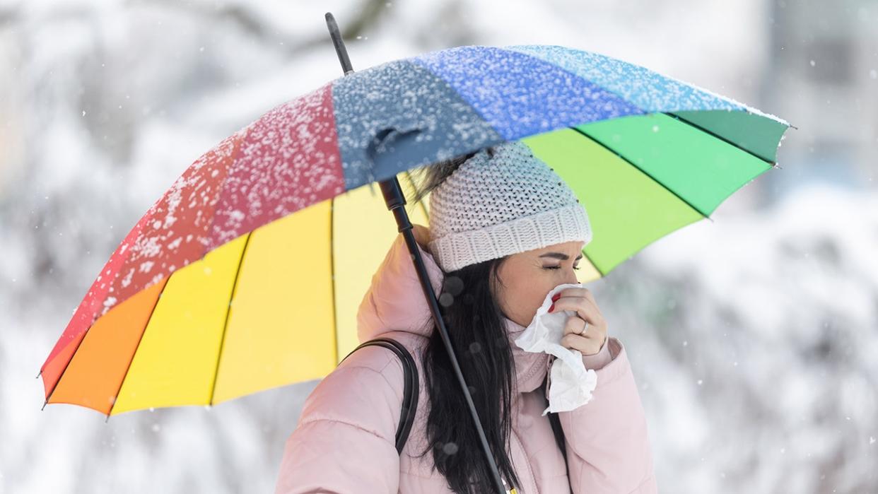 Women under umbrella sick