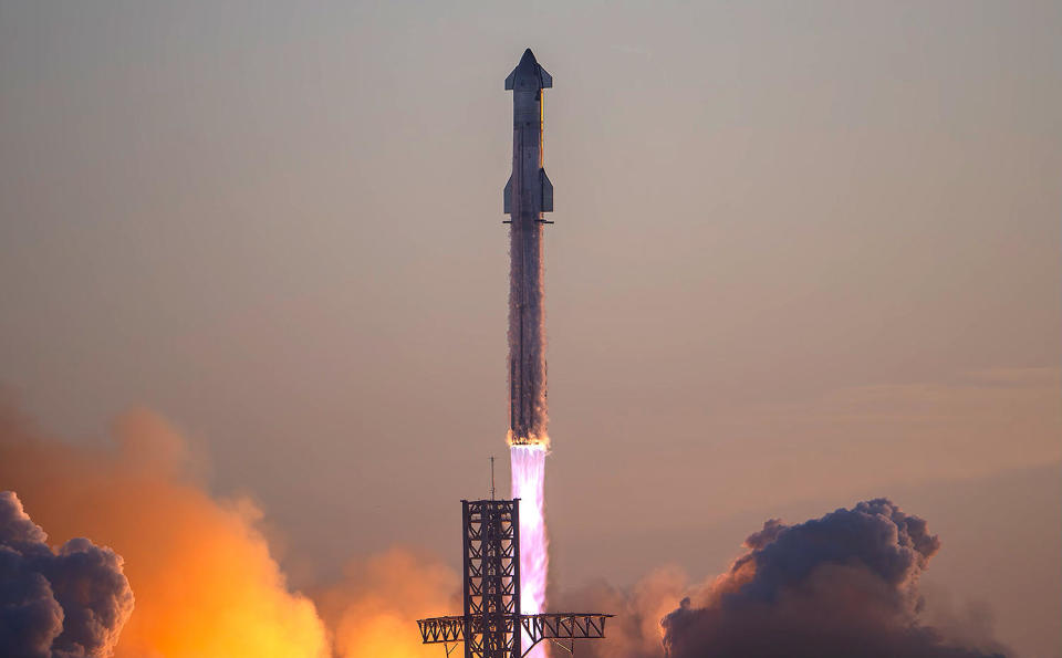 SpaceX's Super Heavy booster with its winged Starship upper stage blasts off on a partially successful test flight from the company's Boca Chica, Texas test facility on November 18.  NASA plans to use another version of the Starship to carry Artemis astronauts from lunar orbit down to the lunar surface.  / Credit: SpaceX