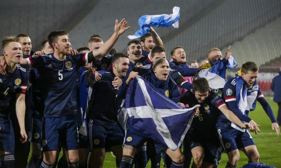 Scotland’s players celebrate after beating Serbia on penalties to seal their qualification for Euro 2020.