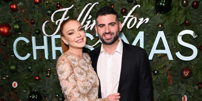 new york, new york   november 09 lindsay lohan and bader shammas attend netflix’s falling for christmas celebratory holiday fan screening with cast  crew on november 9, 2022 in new york city photo by bryan beddergetty images for netflix