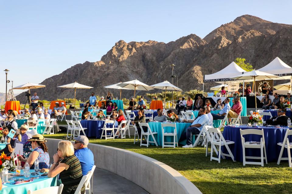 Local business leaders and citizens sit for a presentation from the City of La Quinta and the Greater Coachella Valley Chamber of Commerce during a business update at SilverRock Park in La Quinta, Calif., Wednesday, April 6, 2022.