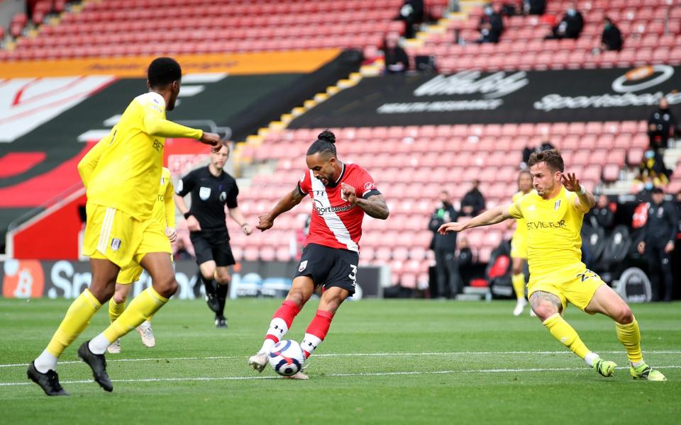 Theo Walcott shapes to shoot before making it 3-1 to Southampton - GETTY IMAGES