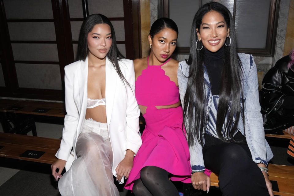 Ming Lee Simmons, from left, Aoki Lee Simmons and Kimora Lee Simmons attend the Prabal Gurung Fall/Winter 2023 fashion show at Gotham Hall on Friday, Feb. 10, 2023, in New York. (Photo by Charles Sykes/Invision/AP)