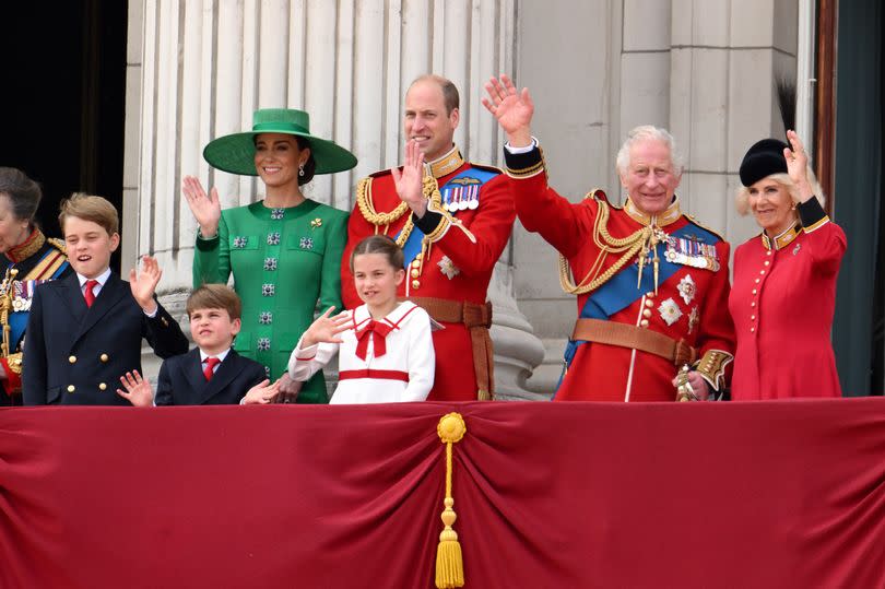 Prince George of Wales, Prince Louis of Wales, Catherine, Princess of Wales, Princess Charlotte of Wales, Prince William, Prince of Wales, King Charles III and Queen Camilla stand on the balcony of Buckingham Palace to watch a fly-past of aircraft by the Royal Air Force during Trooping the Colour on June 17, 2023