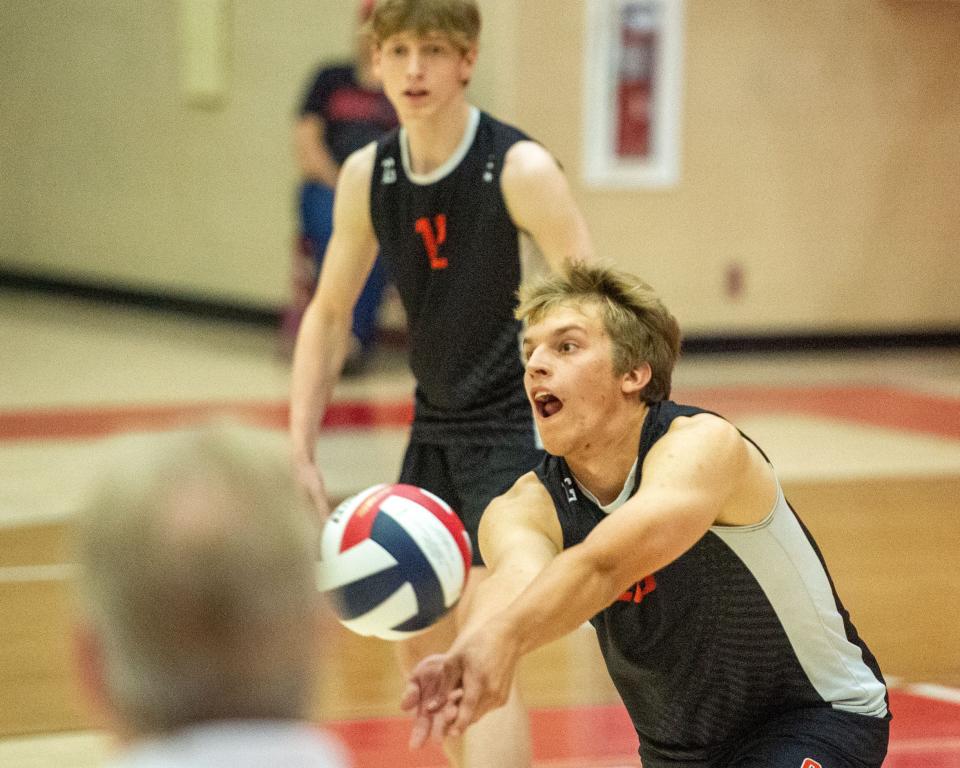 Central York’s Mason Boyer follows the ball as Christian Bucks digs a ball in the District 3 Class 3A final on Thursday, June 1, 2023. CV won 3-0.