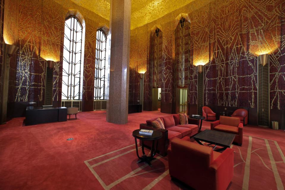 This March 21, 2014 photo shows the work of Art Deco muralist Hildreth Meiere in the glass mosaic Banking Room at One Wall Street in New York. While Meiere's name has been largely forgotten her works abound throughout the country. “The Art Deco Murals of Hildreth Meiere, " by Catherine Coleman Brawer and Kathleen Murphy Skolnik with photographs by Meiere’s granddaughter, Hildreth Meiere Dunn, is set for release May 1. (AP Photo/Richard Drew)