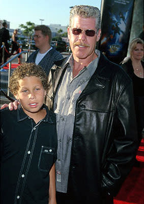 Ron Perlman and his youngster at the Los Angeles Staples Center premiere of 20th Century Fox's Titan A.E.