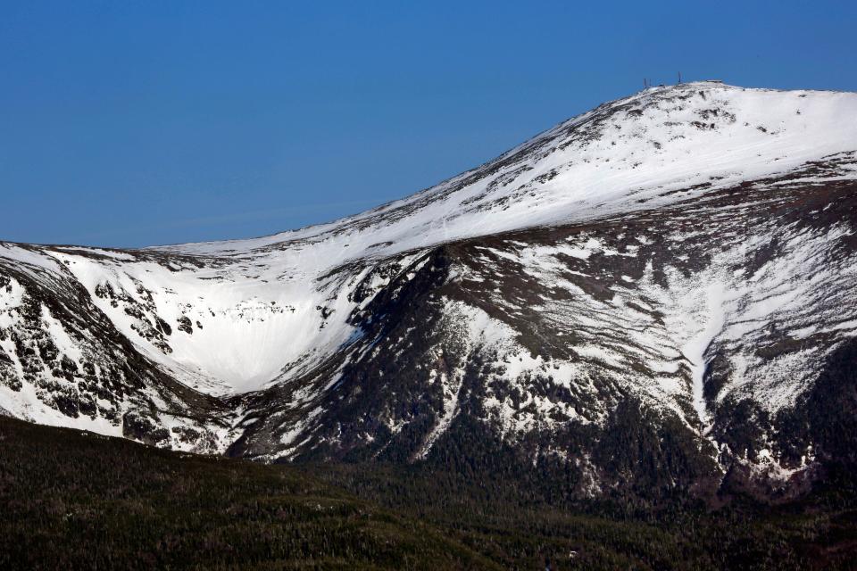 Tuckerman Ravine is seen at left, about one mile below the summit of 6,288-foot Mount Washington, in New Hampshire.